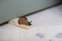 Load image into Gallery viewer, Hand Carved Roman Snail Doorstop
